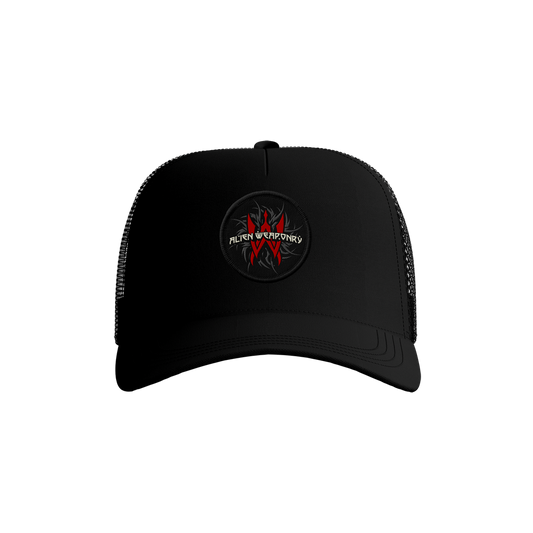 A black trucker hat with a circular logo patch on the front.